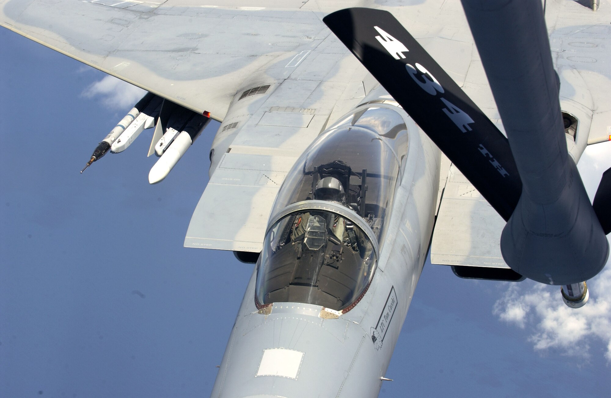 An F-15 Eagle is refueled by a KC-135 Stratotanker from the 434th Air Refueling Wing during training near Jacksonville International Airport, Fla., on July 20. The F-15 is from the 125th Fighter Wing. The training helps aircrews from both units stay proficient in mid-air refueling. (Air National Guard photo/Master Sgt. Shaun Withers) 
