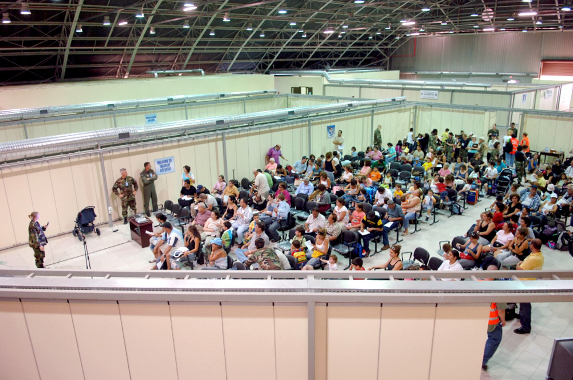 Staff Sgt. Angela Clear (far left) conducts a security briefing for American citizens at Incirlik Air Base, Turkey, on July 24. Sergeant Clear is with the 39th Security Forces Squadron. (U.S Air Force photo/Senior Airman Larry E. Reid Jr.) 

