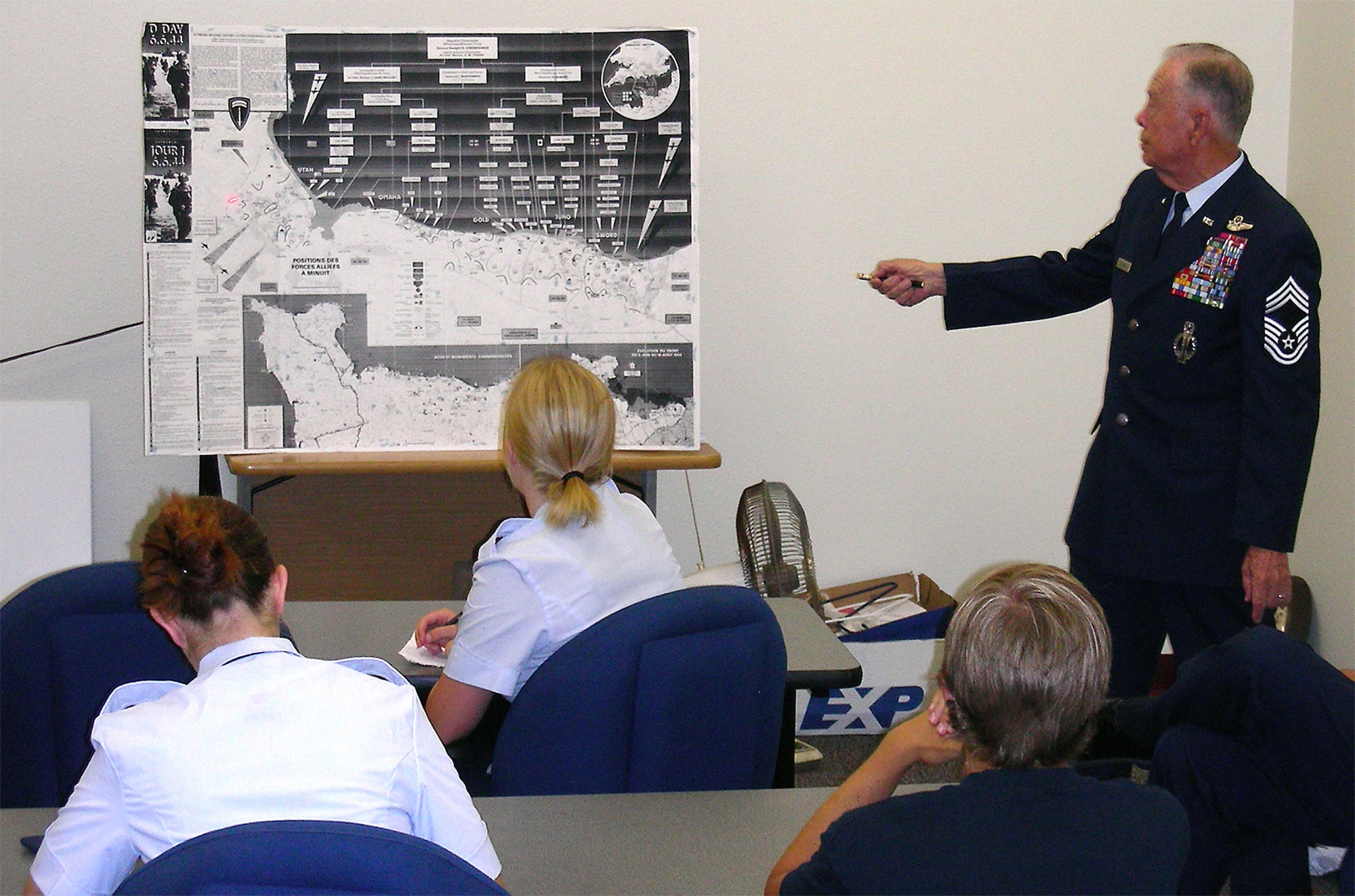 Retired Chief Master Sgt. Richard A. Ortega speaks to Civil Air Patrol cadets about the D-Day Invasion.  Chief Ortega was on the first American assault wave at the beaches of Normandy, France.  (U.S. Air Force photo by Master Sgt. Raymond F. Padgett)
