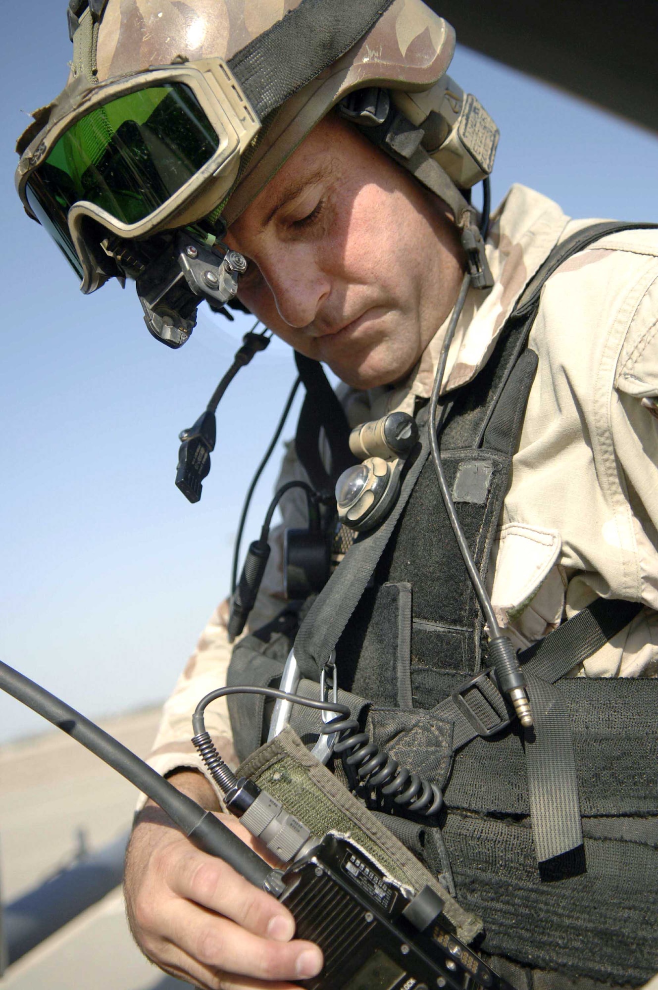 Staff Sgt. Patrick Ryan checks his gear prior to flying to Gila Bend, Ariz., on July 25 for rescue training as part of Exercise Angel Thunder. The five-day exercise, held at Davis-Monthan Air Force Base, Ariz., and other areas is designed to provide realistic combat search and rescue training for active-duty, Reserve and Guard Airmen in combat rescue forces. Sergeant Ryan is a pararescueman with the 48th Rescue Squadron. (U.S. Air Force photo/Senior Airman Christina Ponte) 