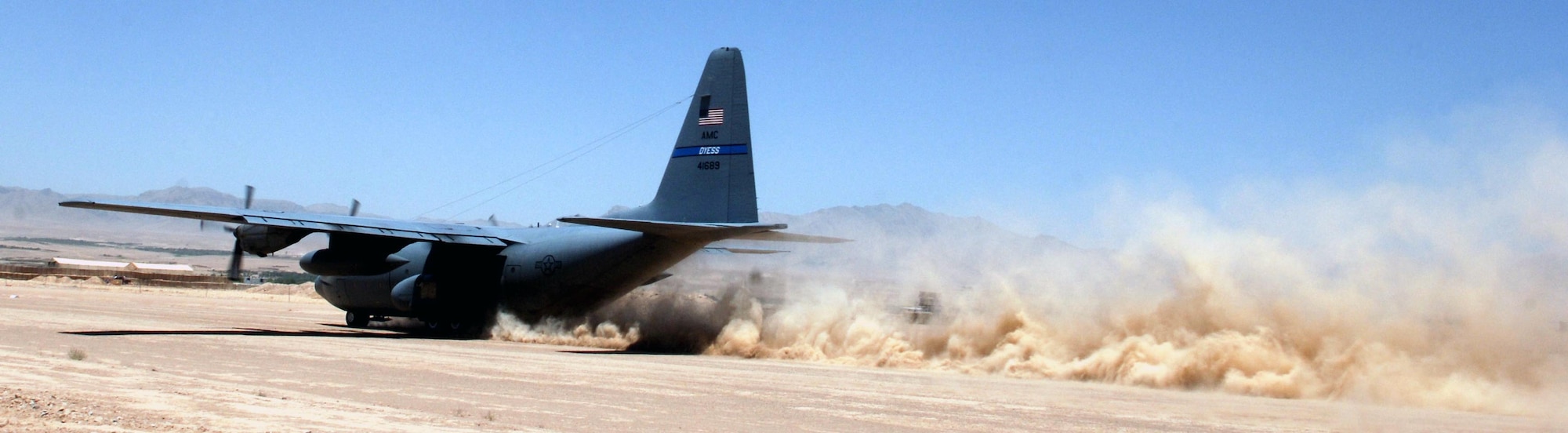 A 455th Air Expeditionary Wing C-130 Hercules touches down on Tarin Kowt?s dirt runway. Because of the increased threat level there, aircrews make the stop there as briefly as possible.