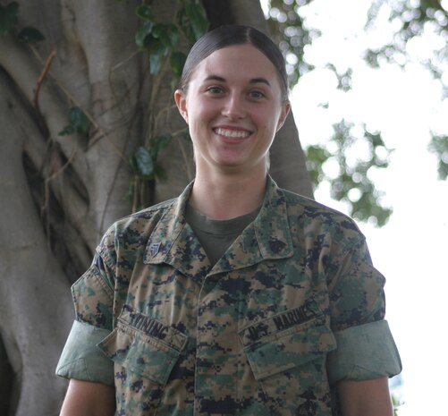 Sergeant Kristin A. Vining, ammunition technician, Base Ordinance, Headquarters Batallion, stands for a picture July 26. Vining plans on staying the Marine Corps as long as possible and said she loves helping her Marines.