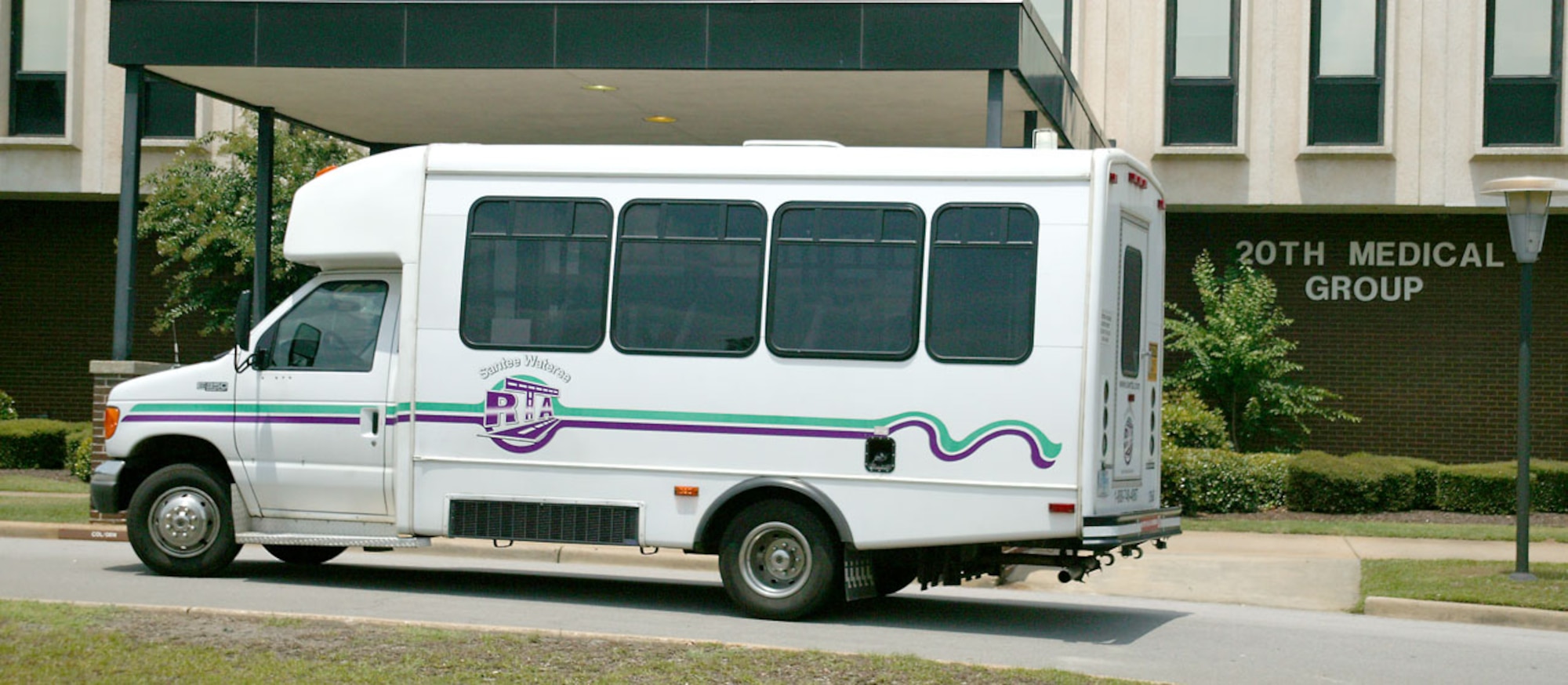 A Santee Wateree regional Transportation shuttle waits outside the 20th Medical Group builidng for passengers Tuesday.  (U.S. Air Force photo/Senior Airman John Gordinier)