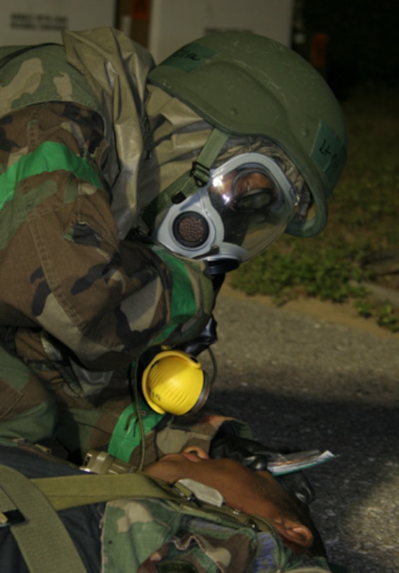 Lt. Col Nancy D'Silva, 919th Medical Squadron flight surgeon, assesses a patient during the Operational Readiness Inspection. The medical squadron provided life support for wing combatants and treated dozens of casualties with varying degrees of injuries during the inspection
