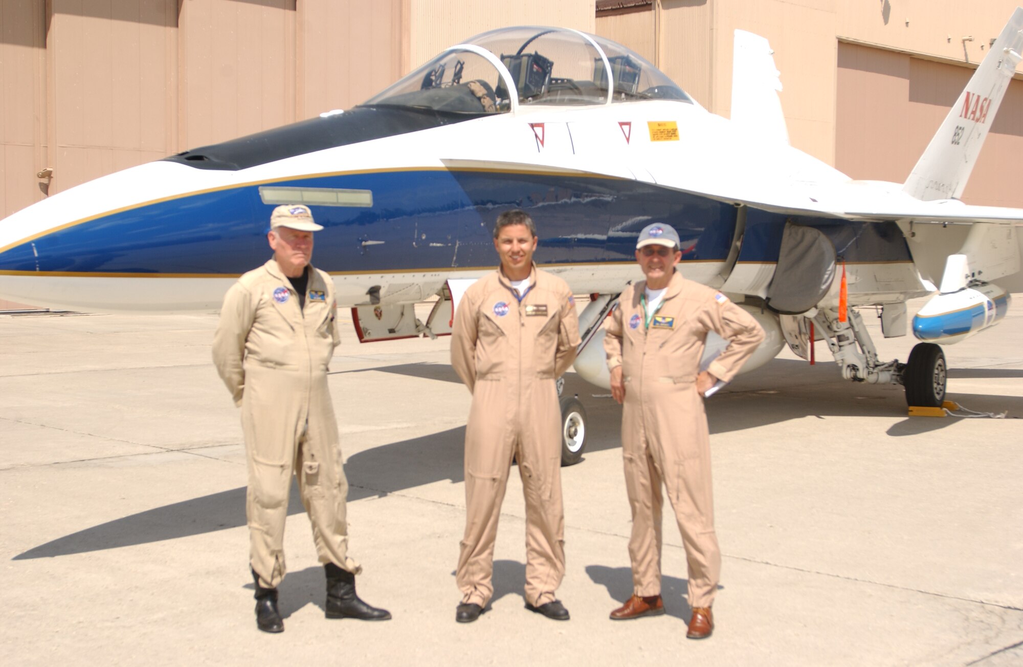 NASA pilots (From left to right) Ed Lewis, MikeThomson and Bill Brockett in front of NASA’s F-18 Hornet at the “Thunder over the Red River” air show Saturday.  (Photo by Tim Rodenger.)