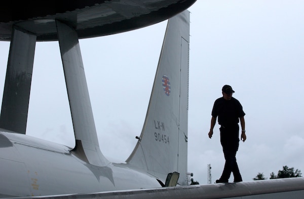 A NATO crew chief inspects the NATO Airborne Warning and Control System after a mission in support of Cooperative Cope Thunder at Elmendorf Air Force Base, Alaska, on July 25. (U.S. Air Force photo/Tech. Sgt. Keith Brown)