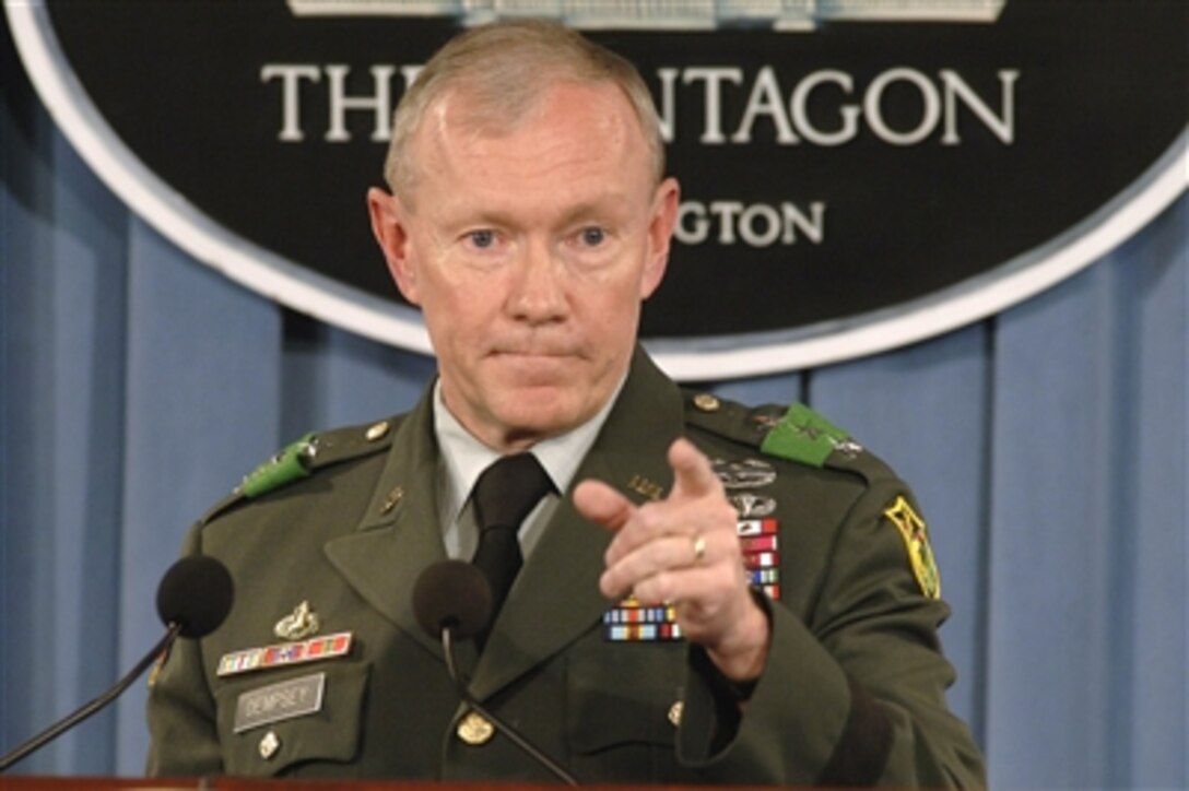 Commander of the Multi-national Security Transition Command in Iraq Lt. Gen. Martin Dempsey, U.S. Army, updates reporters on the transition of Iraqi forces assuming the duties and responsibilities which U.S. forces are currently providing during a Pentagon press conference on June 27, 2006.  