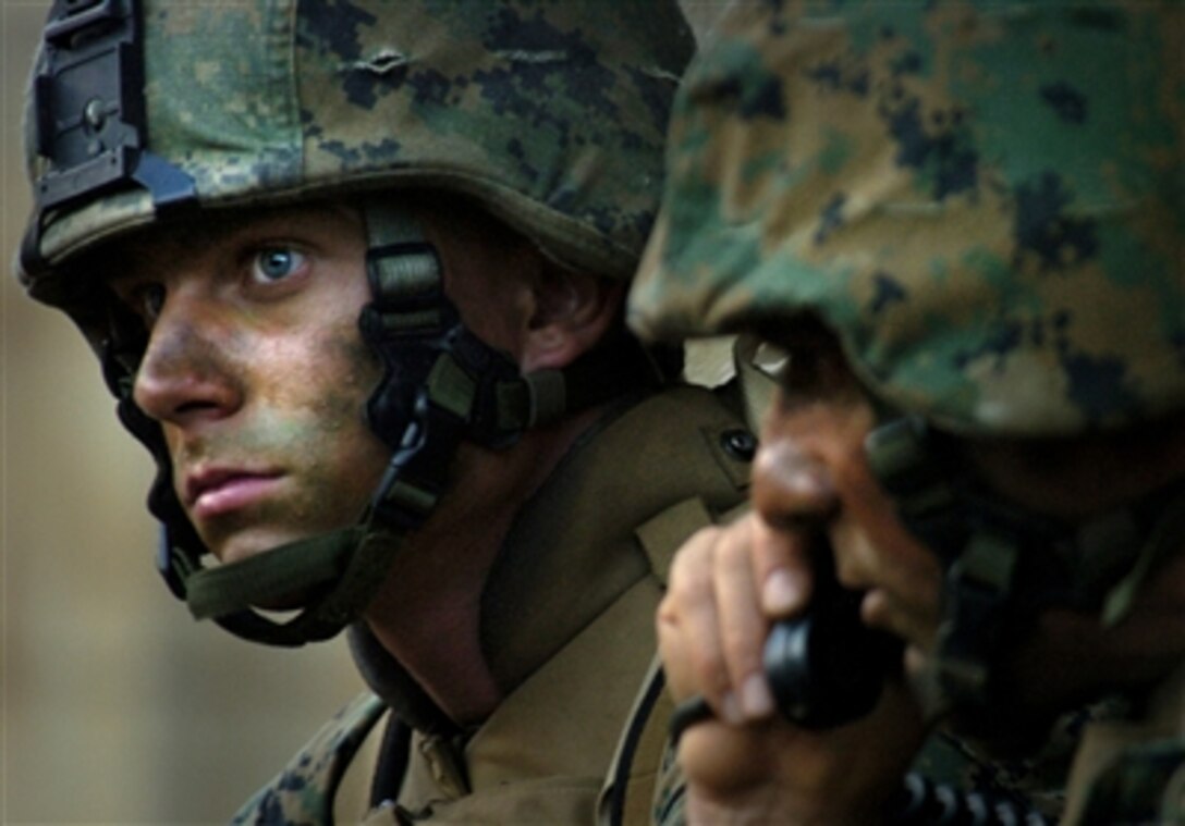 U.S. Marines from 2nd Battalion, 1st Marine Regiment participate in a military operation in urban terrain exercise at the Combined Training Facility on Schofield Barracks, Hawaii, in support of exercise Rim of the Pacific 2006, July 23, 2006. 