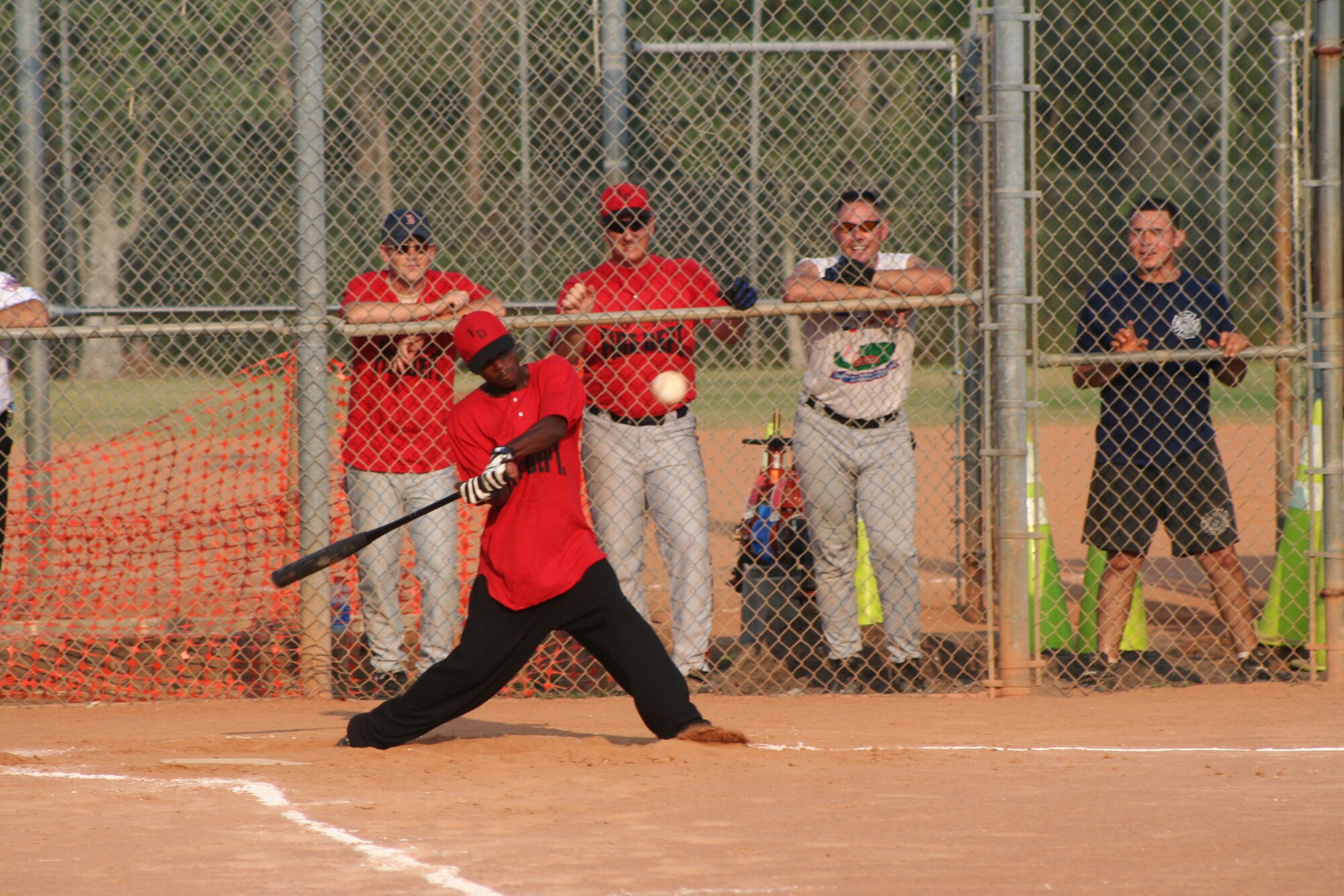 Elliot Lewis, 16th CES, prepares for a base hit during the fifth inning against CONS/STS.