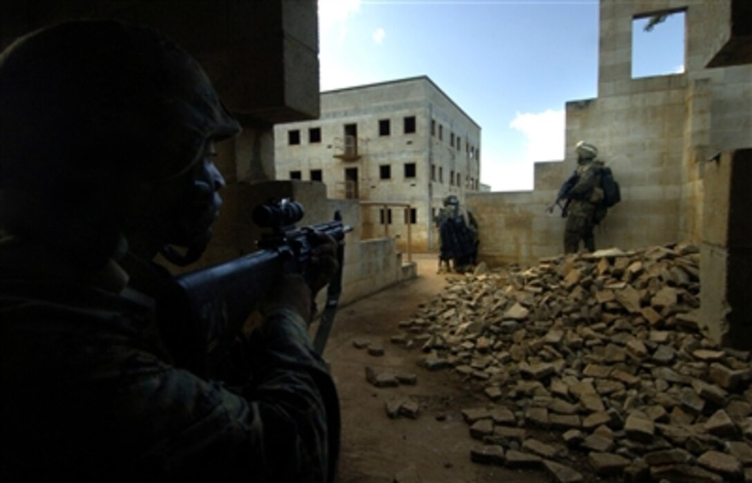 U.S. Marines from 2nd Battalion, 1st Marine Regiment participate in a military operation in urban terrain exercise July 23, 2006, at the Combined Training Facility on Schofield Barracks, Hawaii, in support of exercise Rim of the Pacific 2006. 