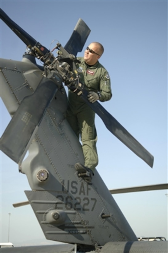 Air Force Staff Sgt. Jon Homan performs an external maintenance ...