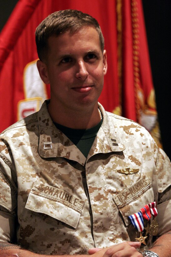 Capt. Jason P. Schauble, future operations officer, Foreign Military Training Unit, Marine Forces Special Operations Command, displays three of the highest decorations within the Department of Defense 28 July; the Silver Star, Bronze Star with a combat ?V,? and the Meritorious Service Medal. Schauble?s ceremony recognized his heroic contributions during Operation Iraqi Freedom and the establishment of the FMTU.