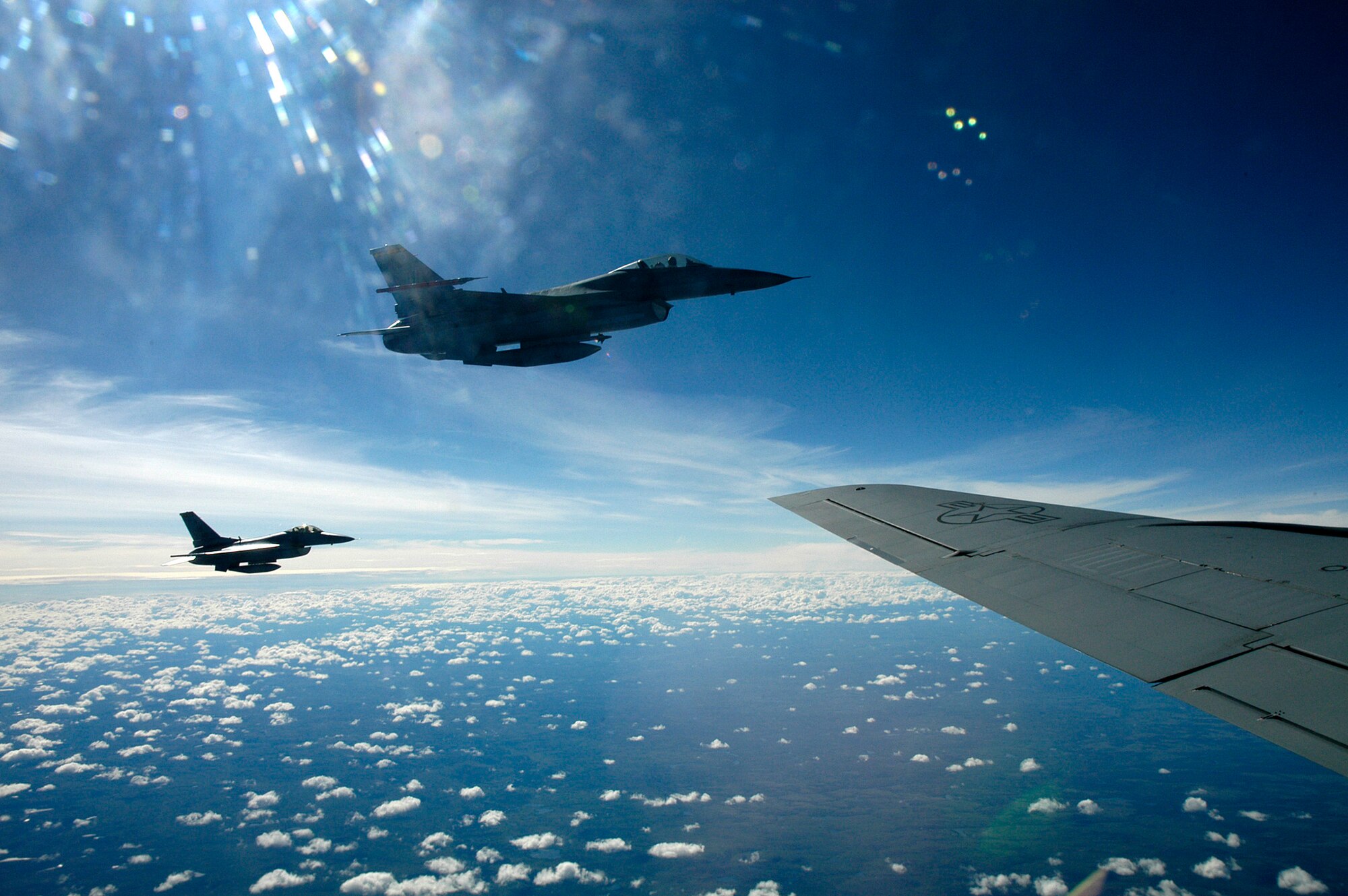 EIELSON AFB, Alaska -- A pair of F-16C from Hill AFB preparing to conduct air-to-air refueling during Cooperative Cope Thunder 06-03.  Photo by 1st Lt. Peter Liander, Swedish Air Force                              