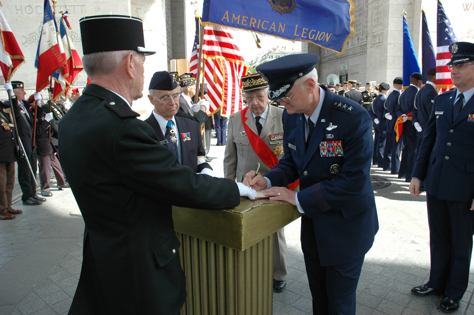 Lt. Gen. Robert Bishop, Headquarters U.S. Air Forces in Europe vice commander signs a memorial log book Sunday at the Arc de Triumph in Paris as part of the Memorial Day Ceremony there.  The USAFE Elite Guard and the USAFE Band also participated in the ceremony to honor those who have died in our nation's service.

