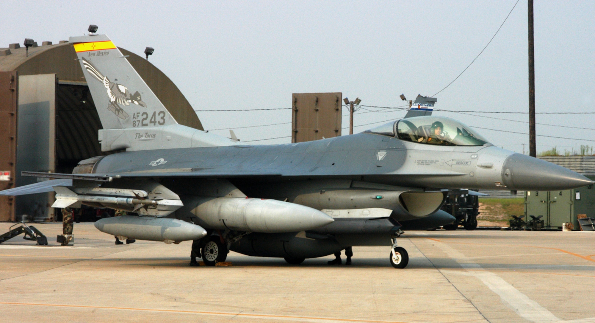 An F-16 Fighting Falcon from the New Mexico Air National Guard's 150th Fighter Wing parks at Kunsan Air Base, South Korea. Elements of fighter wings from three Air National Guard units have deployed here in support of the air expeditionary force. (U.S. Air Force photo/Staff Sgt. Becky Nelson) 
