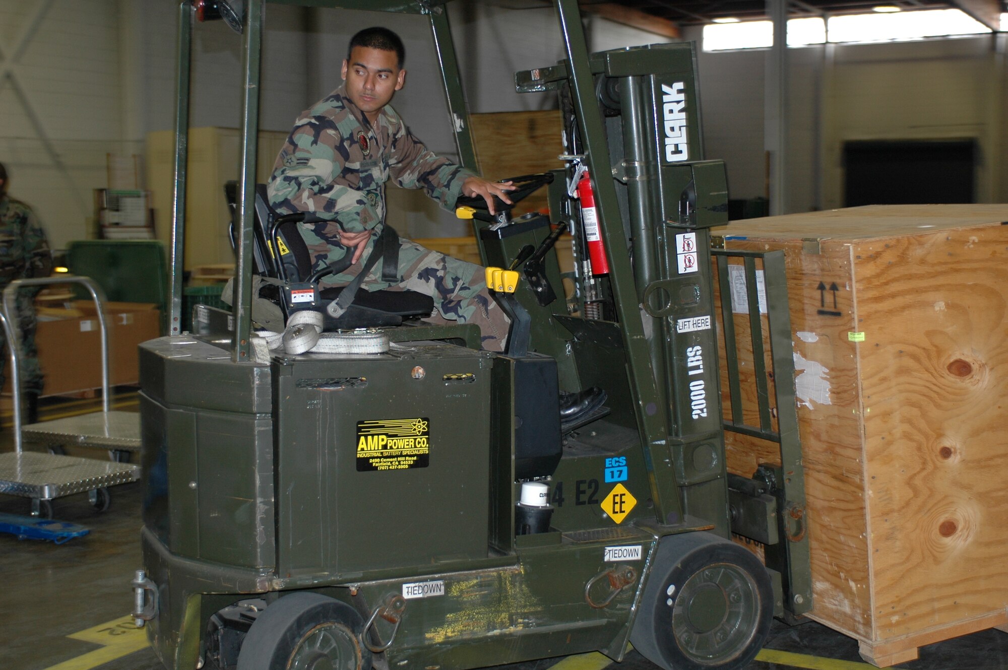 Airman 1st Class Adbel Velasquez-Villibord, receiving technician, uses a forklift to move new C-17 parts to the proper place in the warehouse. More than 30 people have worked more than 6,000 to properly place the new C-17 parts. (U.S. Air Force photo by Jennifer Brugman)