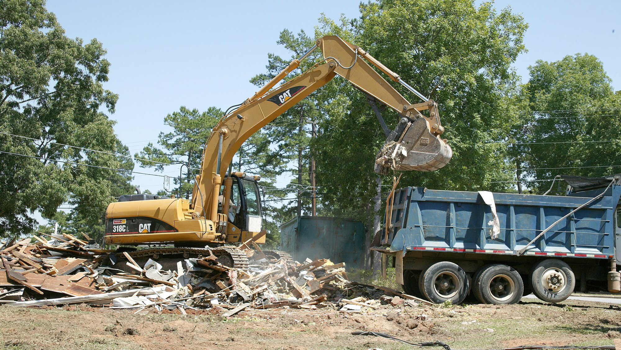In an effort to lower maintenance costs, 180 base housing units are being demolished.  (U.S. Air Force Photo/Senior Airman Susan Penning)