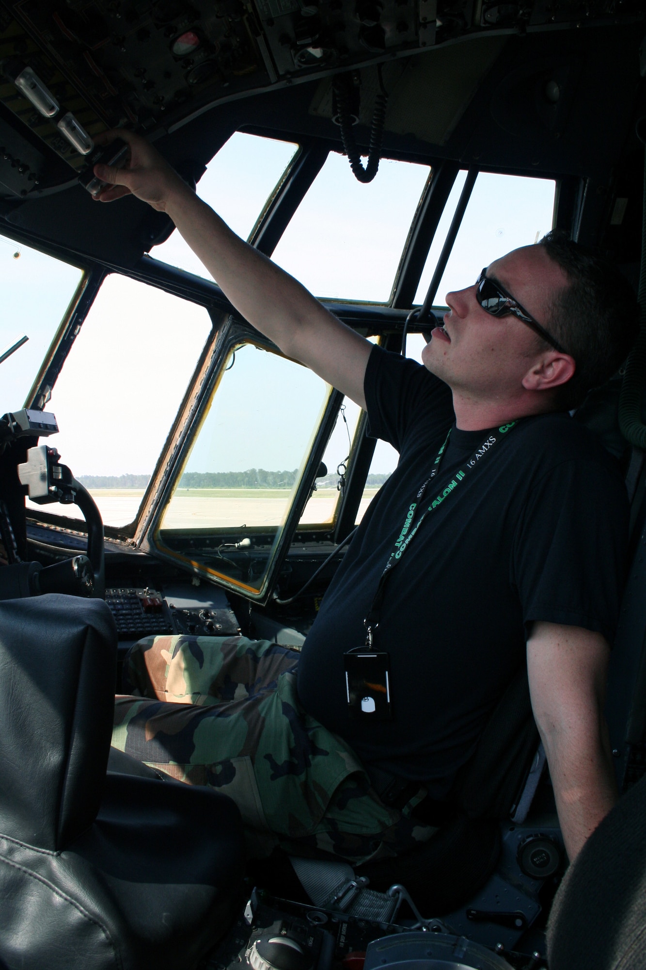 Senior Airman Steven Ogden, a 15th AMU guidance control specialist, checks the fuel quantity gauges on an MC-130H Combat Talon II as part of the ORI.