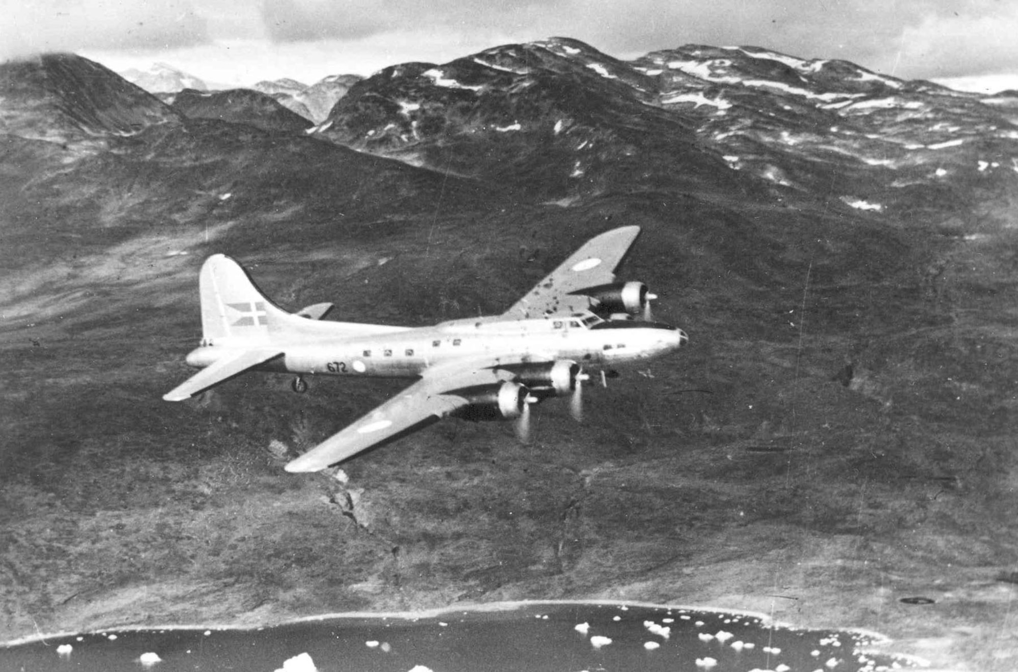 Boeing B-17G "Shoo Shoo Shoo Baby" in flight.  The aircraft carried the name "Store Bjorn" while in service with Denmark. (U.S. Air Force photo)