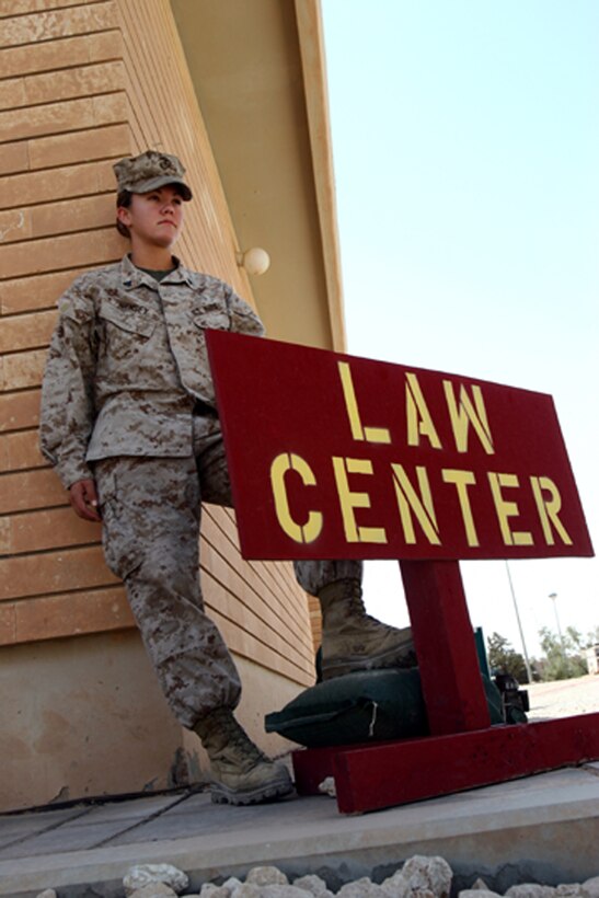 Cpl. Laura B. Ramsey takes a minute to take in her surroundings June 2, 2006, at Al Asad, Iraq. Ramsey, a Newport News, Va., native is a legal services specialist with Marine Wing Headquarters Squadron 3, 3rd Marine Aircraft Wing.