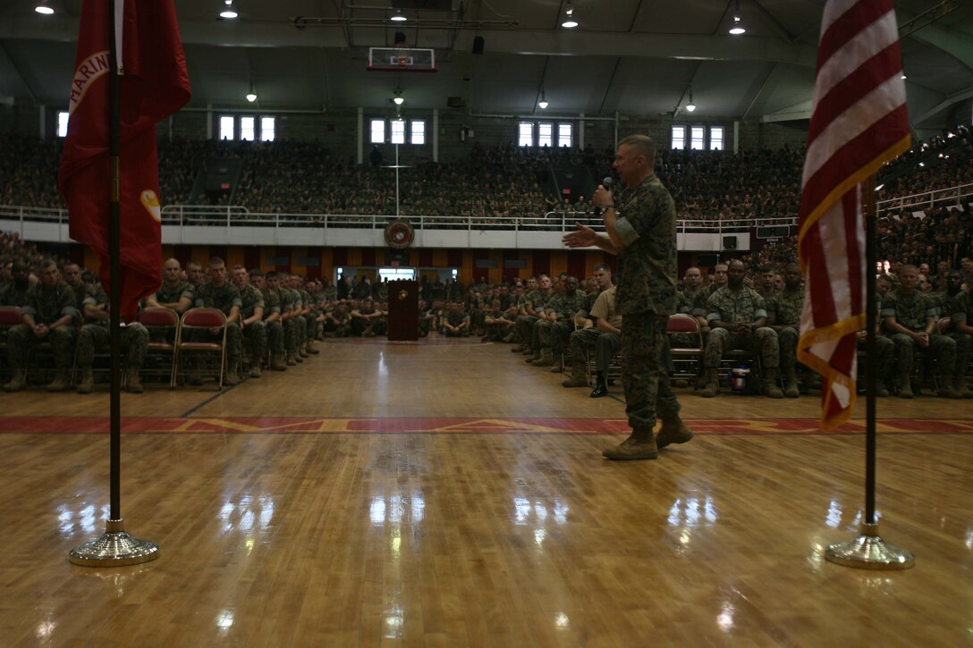 General Michael W. Hagee, commandant of the Marine Corps,  addresses Marines and Sailors at the Goettge Memorial Field House June 2. He spent the time talking to Marines about corps values, listening to concerns and answering questions. He will continue to address service members in and out of country for the next several weeks. The 3rd Battalion, 2nd Marine Regiment was one of many unit in attendance.