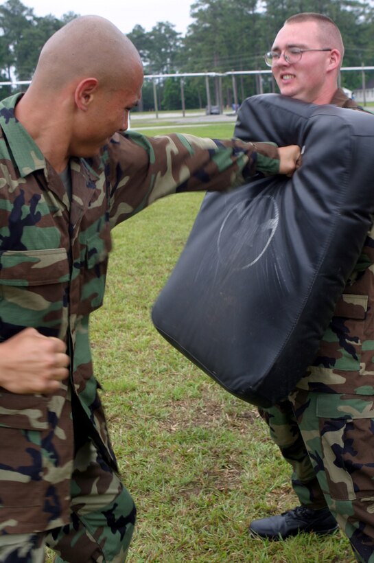 MARINE CORPS BASE CAMP LEJEUNE, N.C. (June 5, 2006) ? A Naval Reserve Officer Training Corps student sends out a punch to a bag here June 5. A select few Naval Reserve Officer Training Corps college students, they will spend sometime in the swamp-lands of humid North Carolina getting a taste of what it?s like to be a Marine and are demonstrated Marine Corps Martial Arts by the Marines of 2nd Marine Logistics Group.