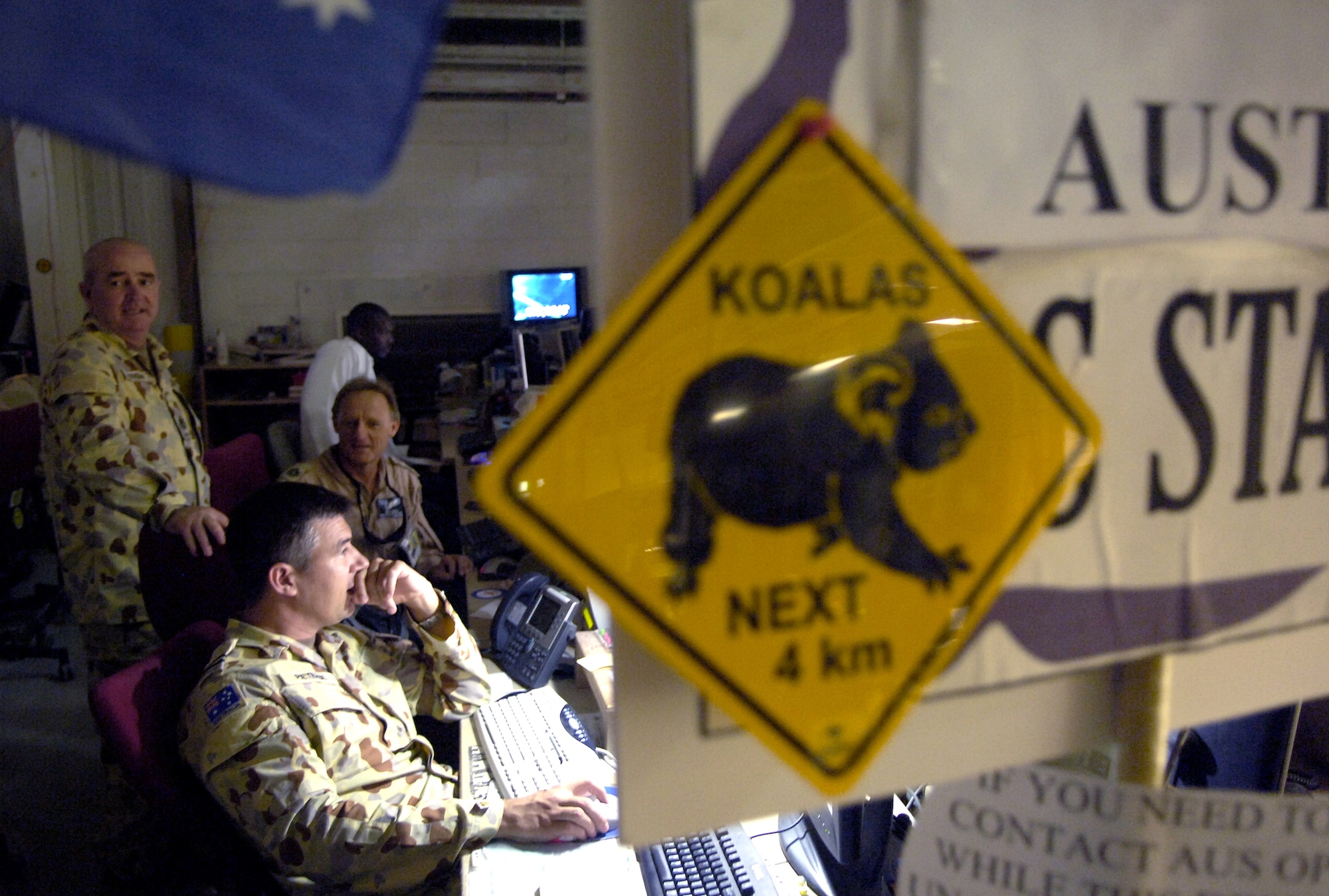 Airmen of the Royal Australian Air Force work at the Combined Air Operations Center in Southwest Asia on Thursday, June 1, 2006. (U.S. Air Force photo/Senior Airman Brian Ferguson) 


