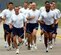 Command Chief Master Sgt. Herb Hanson and Brig. Gen. Darren McDew lead the pack as Team Pope returns from a formation run that kicked off Wingman Day May 25.
