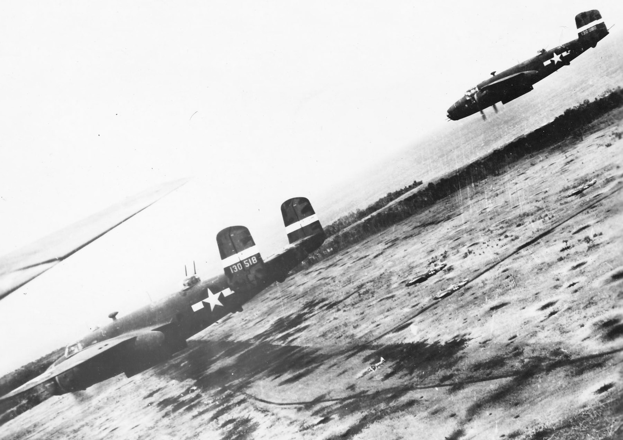 North American B-25s in action over Gloucester in December 1943. (U.S. Air Force photo)