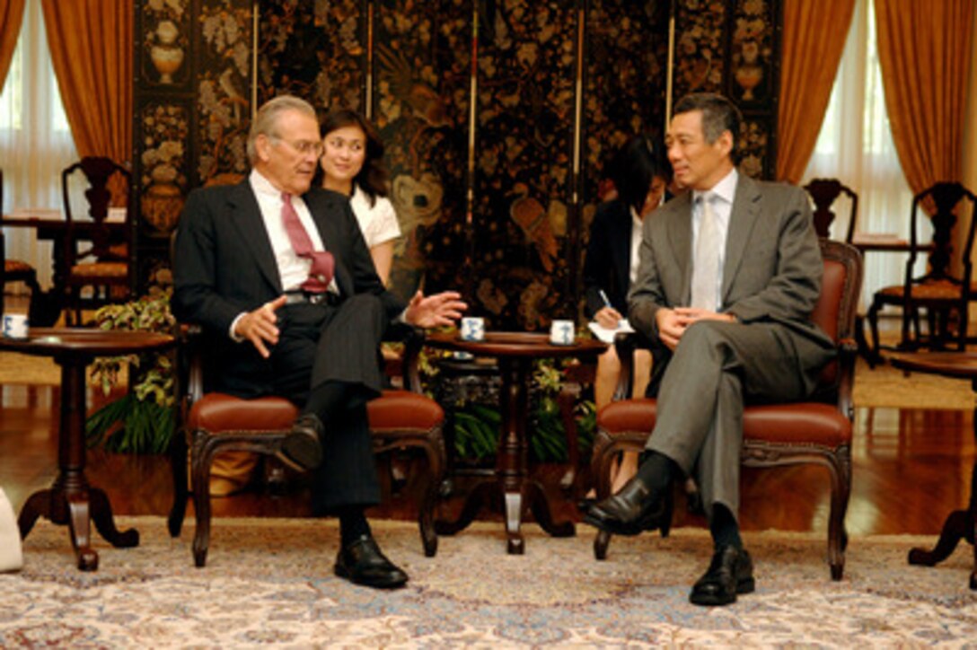 Secretary of Defense Donald H. Rumsfeld meets with Singapore's Prime Minister Lee Hsien Loong in the Istana in Singapore on June 3, 2006. Rumsfeld is in Singapore to meet with regional allies and attend the fifth annual International Institute for Strategic Studies Asia Security Conference known as the Shangri-La Dialogue. 