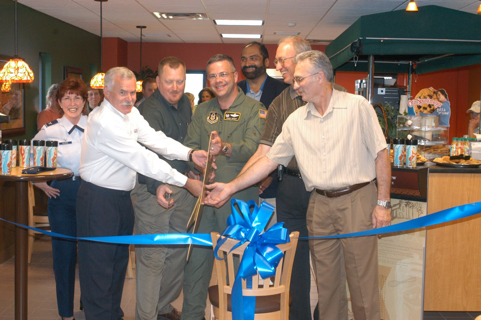 The Grand Opening of the Perksburgh Cafe' was held on Saturday June 3. From left to right, Colonel Patricia Blassie, Mission Support Group Commander; Mr. Jerry Cardinal, AFRC Services Director; Mr. Chris McIntire, 911th Services Director; Colonel Randal Bright, Wing Commander; Mr. Franco Harris, Former Pittsburgh Steeler; Mr. Bob Moeslein, Base Civil Engineer; Mr. Phil Frantangeli, Santa Barbara Applied Research Project Manager