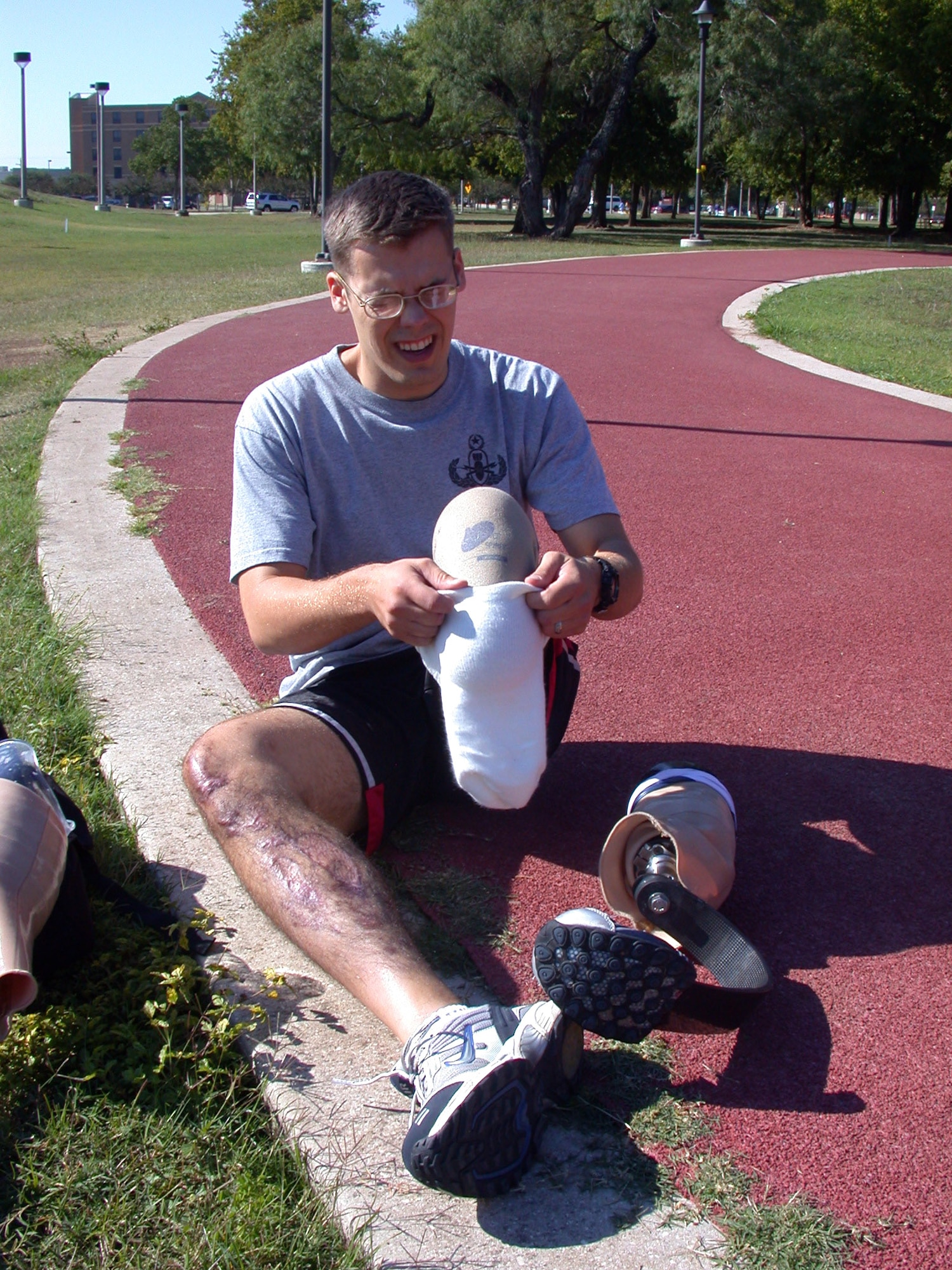 Staff Sgt. Chris Ramakka prepares to go for a jog. He has a prosthetic for walking and one for running.  (U.S. Air Force photo/Master Sgt. Michael A. Ward) 
