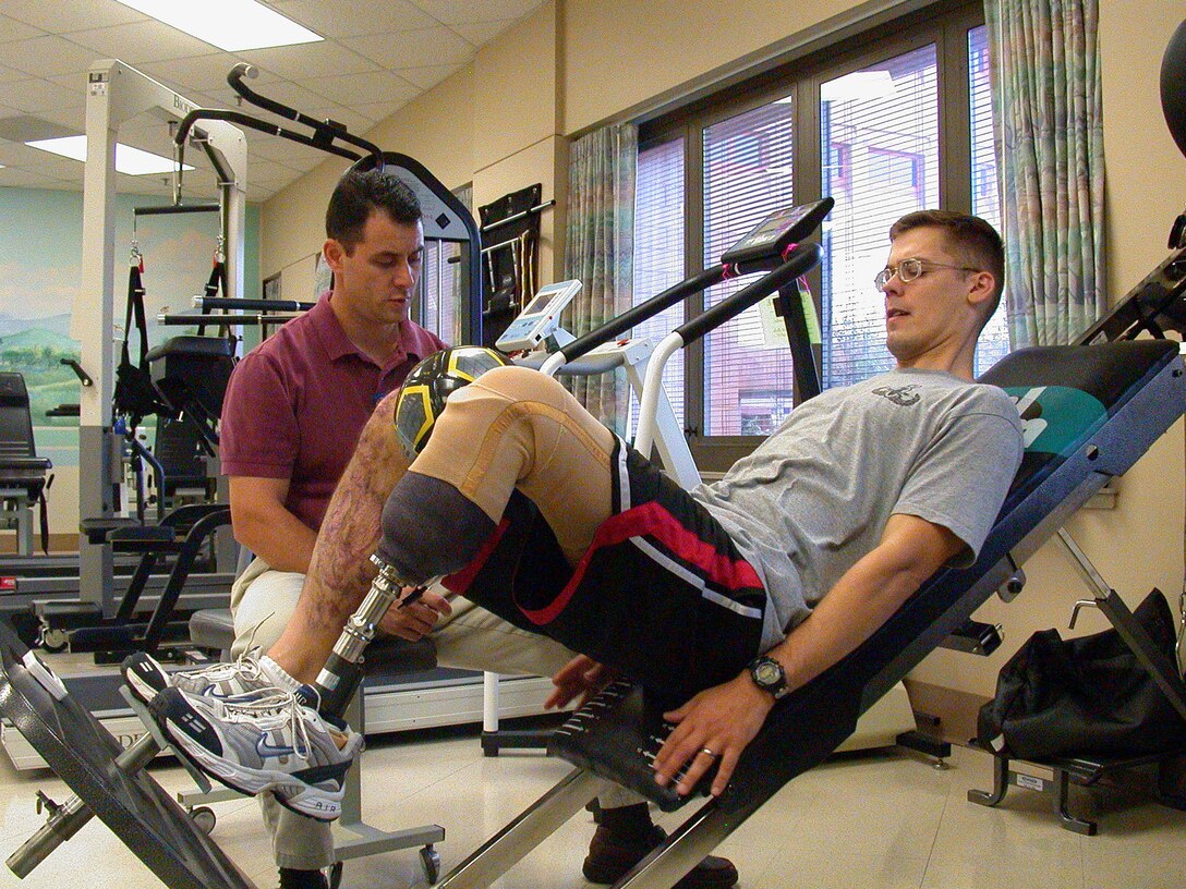 Staff Sgt. Chris Ramakka goes through physical therapy at Brooke Army Medical Center in San Antonio. (U.S. Air Force photo/Master Sgt. Michael A. Ward) 