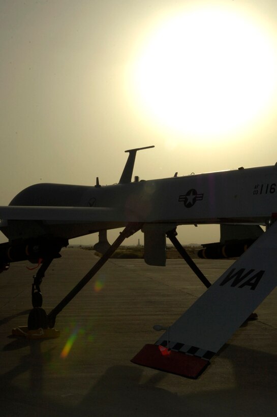 An MQ-1 Predator unmanned aerial vehicle sits in the desert sun at Balad Air Base, Iraq, on Tuesday, June 6, 2006. Providing "real-time eyes-in-the-sky," the world's largest Predator operation is based here with a squadron of about 20 aircraft. (U.S. Air Force photo/Airman 1st Class Drew Oquendo) 