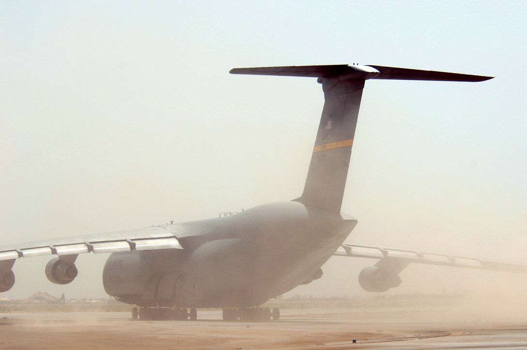 A C-5 Galaxy taxis for takeoff at Balad Air Base, Iraq, on Tuesday, June 6, 2006. The aircraft is from Dover Air Force Base, Del. (U.S. Air Force photo/Staff Sgt. Tony R. Tolley) 
