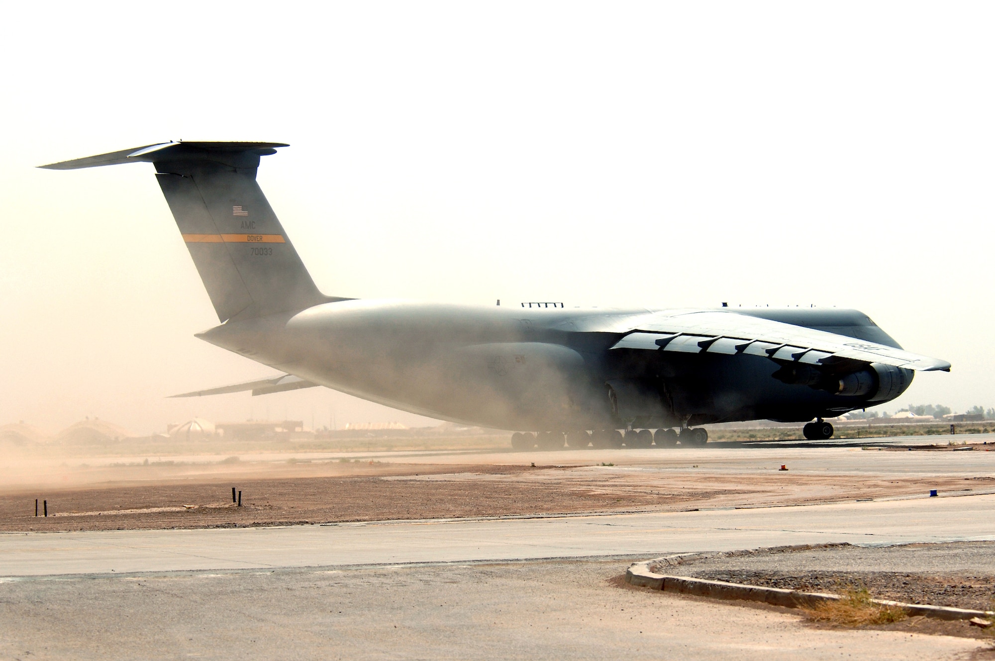 A C-5 Galaxy taxis for takeoff at Balad Air Base, Iraq, on Tuesday, June 6, 2006. The aircraft is from Dover Air Force Base, Del. (U.S. Air Force photo/Staff Sgt. Tony R. Tolley) 
