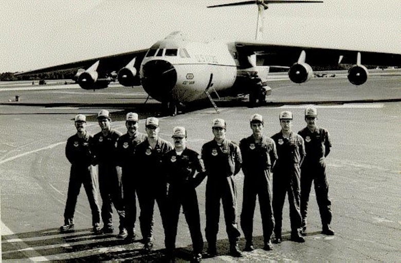 The 1983 edition of the 315th Military Airlift Wing's Rodeo pose in front of their C-141B Starlifter.  (USAF Historical Photograph) 