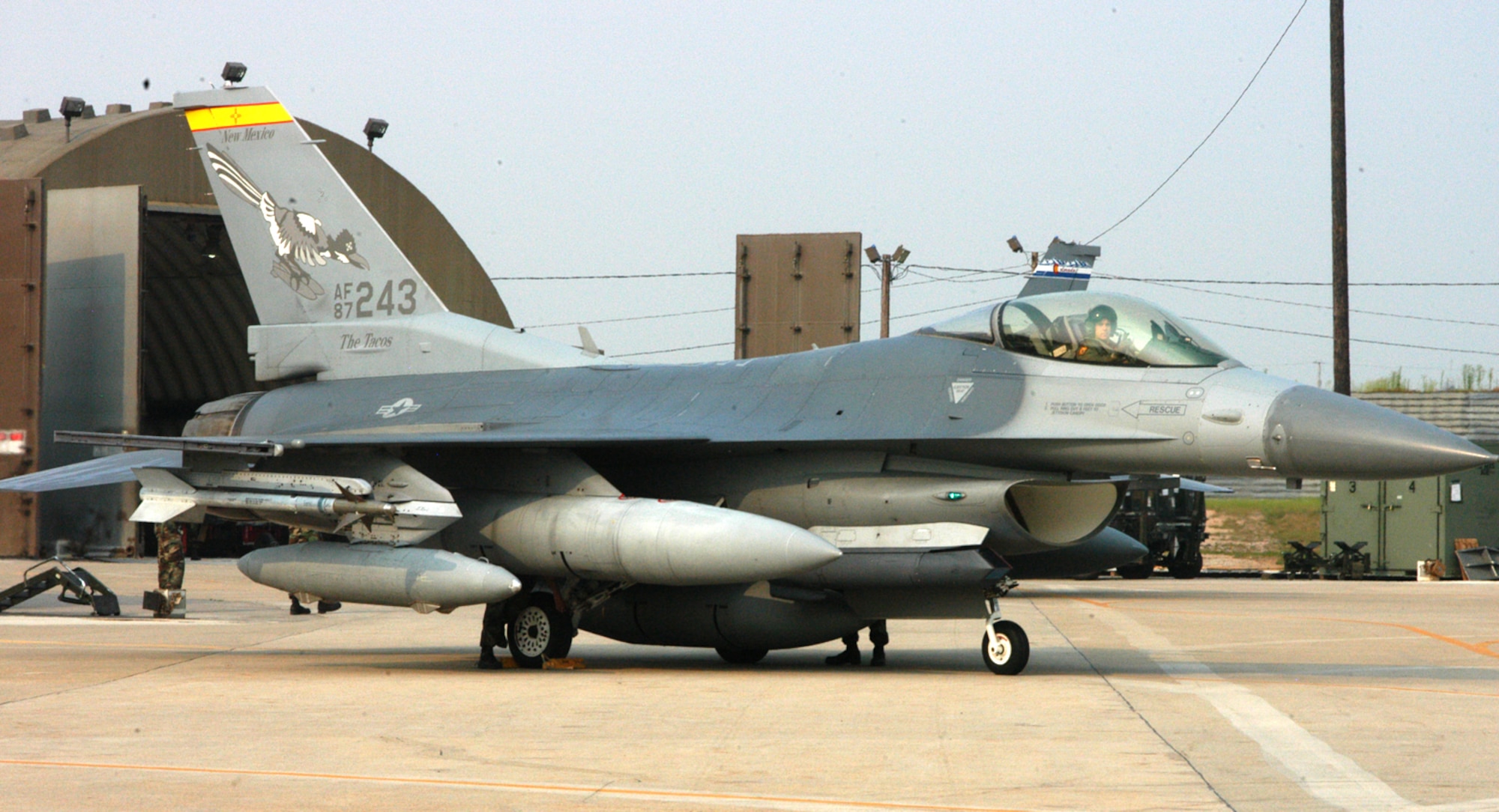 KUNSAN AIR BASE, Republic of Korea -- An F-16 from the New Mexico Air National Guard's 150th Fighter Wing, commonly referred to as "The Tacos," prepares to beddown recently after deploying to Kunsan Air Base as part of the unit's Air Expeditionary Force rotation. The 150th FW integrated with the 140th and 120th FWs, each from the Colorado and Montana ANGs respectively, to become the 186th Expeditionary Fighter Squadron. (Air Force photo by Staff Sgt. Becky Nelson)                               