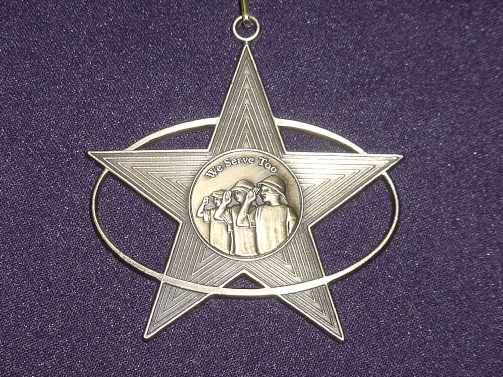 Children of deployed Massachusetts National Guard and Air National Guard servicemembers now receive this special Youth Service Award.  The medals were created to recognize the service and sacrifice of the children during a deployment. (U. S. Army photo/Jennifer Cesaitis)

