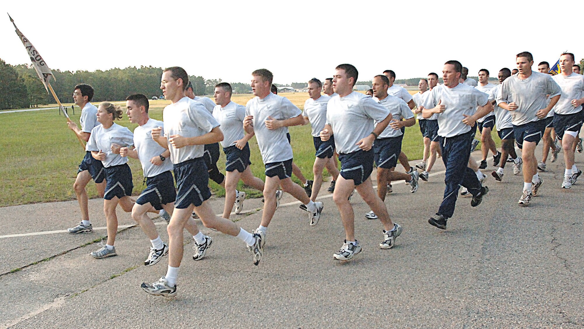 The 682nd Air Support Operations Squadron runs in unison while singing cadence during the early morning warrior run June 2.  The warrior run occurs the first Friday of every month.  (U.S. Air Force Photo/Tech. Sgt. Keri Whitehead)
