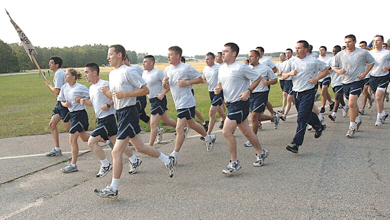 The 682nd Air Support Operations Squadron runs in unison while singing cadence during the early morning warrior run June 2.  The warrior run occurs the first Friday of every month.  (U.S. Air Force Photo/Tech. Sgt. Keri Whitehead)
