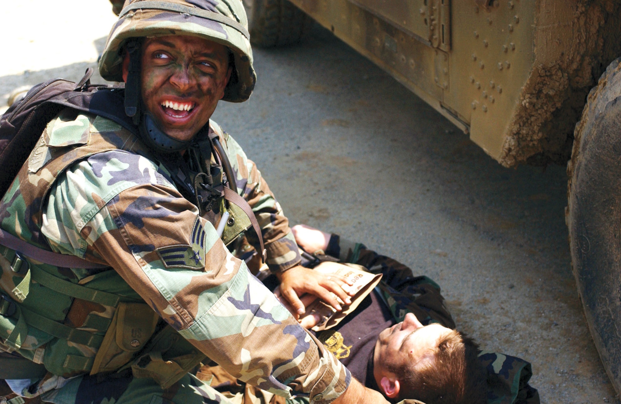 Senior Airman Nathan Randall calls for help during a Commando Warrior class exercise at Osan Air Base, South Korea. Commando Warrior trains Airmen throughout the Pacific Air Forces area for deployments supporting the war on terrorism. Airman Randall is assigned to Kulis Air National Guard Base, Alaska. (U.S. Air Force photo/Amn. Gina Chiaverotti)