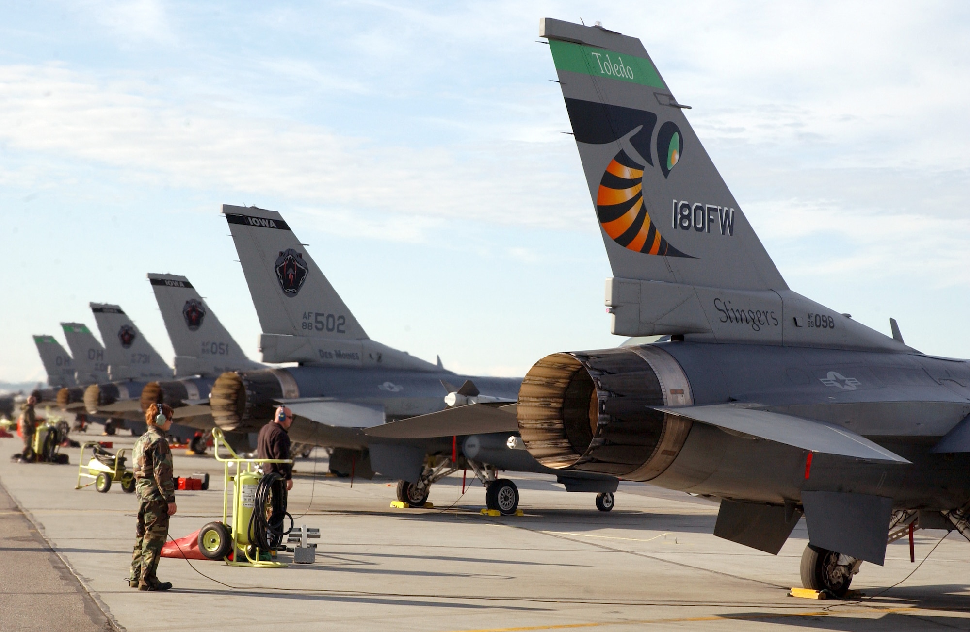 F-16 Fighting Falcons from Iowa and Ohio Air National Guard units sit ready on the flightline at Eielson Air Force Base, Alaska, on Tuesday, June 6, 2006, during Exercise Northern Edge 2006. The joint training exercise hosted by Alaskan Command is one of a series of U.S. Pacific Command exercises that prepare joint forces to respond to crises in the Asian Pacific region. (U.S. Air Force photo/Staff Sgt. Joshua Strang)