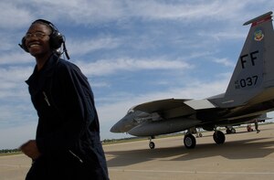 Staff Sgt. Kevin Rains,a dedicated crew chief assigned to the 71st Fighter Squadron, launches out Captain Bradley Brumbaugh, a  F-15 Eagle pilot also attached to the 71st Fighter Squadron, on 24 May 06 Langley Air Force Base, Virginia. Due to runway construction at Langley, the 71st, 27th, and 94th Fighter Squadrons are departing the installation until flight line upgrades are complete. (USAF Photo By SSgt Samuel Rogers)