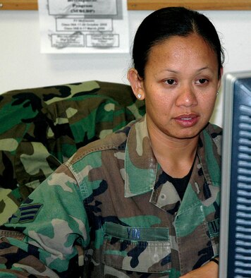 McChord Air Force Base, Wash., - Senior Airman Lyn Yin, 728th Airlift Squadron, here, is currently activated in support of ongoing C-17 operations. (U.S. Air Force photo by Sandra Pishner)