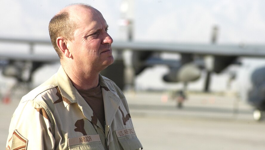 BAGRAM AIRFIELD, Afghanistan -- Master Sgt. Jimmy Armor surveys the flighline here.  Sergeant Armor is a logistics planner deployed here from the 442nd Fighter Wing, Whiteman Air Force Base, Mo., and was named the senior NCO of the month for the 455th Expeditionary Maintenance Group here for the month of May.  (US Air Force photo/Maj. David Kurle)