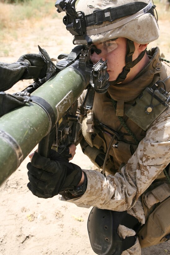 Lance Cpl. Richard M. Mason II serves as an assaultman for 2nd Platoon, Company K, 3rd Battalion, 8th Marine Regiment. Nicknamed the "Rocket Man," the 20-year-old from Medina, Ohio has effectively fired 24 rockets using the Shoulder-Launched Multi-Purpose Assault Weapon or SMAW during combat operations in Ar Ramadi. The portable anti-armor rocket launcher has the sole purpose of destroying bunkers and other fortifications during assault operations. 3/8 is currently deployed with I Marine Expeditionary Force (Forward) in support of Operation Iraqi Freedom in the Al Anbar province of Iraq to develop the Iraqi Security Forces, facilitate the development of official rule of law through demographic government reforms, and continue the development of a market based economy centered on Iraqi reconstruction.   USMC photo by Cpl. Joseph DiGirolamo  060610-M-0008D-004