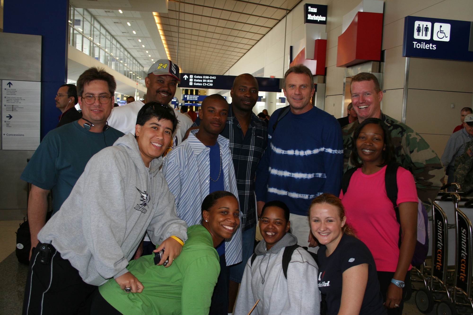 While awaiting a flight to Japan, ten reservists from the 301st Services Flight had a chance encounter with three-time Super Bowl MVP and NFL Hall of Famer, Joe Montana. (U.S. Air Force Photo/Tech. Sgt. James A. Gilbertson) 