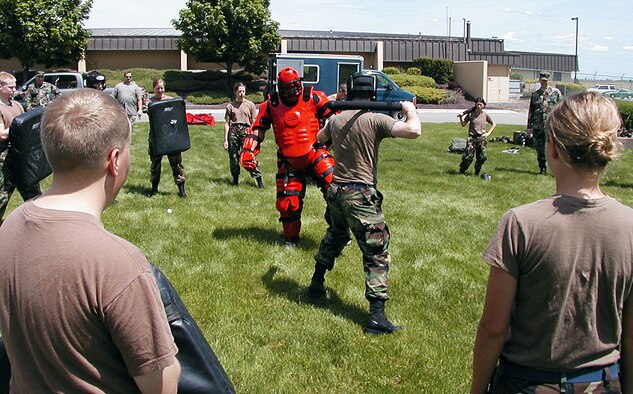 Air Force Reserve Officers' Training Corps cadets participate in security forces "Redman" baton training. The cadets will spend three weeks at Fairchild during their summer training as part of AFROTC Rising Sophomore Program. The program will afford the cadets exposure to various AF professions while shadowing Non-commissioned officers and officers.