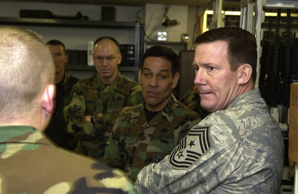 MALMSTROM AIR FORCE BASE, Mont.--Chief Master Sgt. Ron Kriete, command chief master sergeant, Air Force Space Command, listens to a briefing on procedures for issuing weapons during a tour of the 341st Security Forces Group armory here. Chief Kreite accompanied former AFSPC Commander General Lance W. Lord on a tour of the base Jan. 21.  The chief announced his intent to retire June 12. (U.S. Air Force Photo by Roger M. Dey)